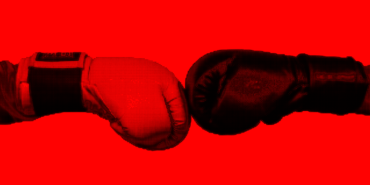Boxing gloves with red background. 